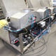 Rear of Cleaning Lineand Company Enclosed Manual Cleaning Line